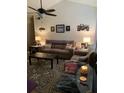 Living room with brown couch and coffee table at 4802 51St W St # 1106, Bradenton, FL 34210