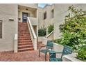 Brick patio with seating area, providing a relaxing outdoor space at 5128 Marsh Field Ln # 129, Sarasota, FL 34235