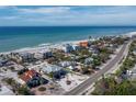 Beautiful aerial view of a home near the beach, showcasing the property lines and nearby homes at 6473 Gulf Of Mexico Dr, Longboat Key, FL 34228