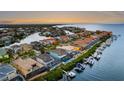 Waterfront homes situated along a canal with boats and lush greenery at 1215 Acappella Ln, Apollo Beach, FL 33572