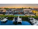 Waterfront property with a private pool and boat dock, near other homes at 1215 Acappella Ln, Apollo Beach, FL 33572