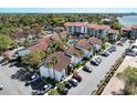 Aerial view showing multiple buildings and parking at 1618 Stickney Point Rd # 1618-202, Sarasota, FL 34231