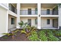 Condo building with lush landscaping and private entryways at 17724 Gawthrop # 103, Bradenton, FL 34211