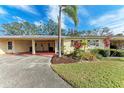 Front view of a single story home with carport at 390 301 W Blvd # 8C, Bradenton, FL 34205