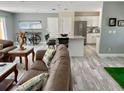 Spacious living area with kitchen and island views at 3907 10Th Avenue W Dr, Bradenton, FL 34205