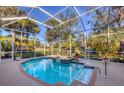 Screened-in pool and spa area, perfect for relaxing or entertaining outdoors at 5245 88Th E St, Bradenton, FL 34211
