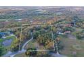 Aerial view of property showing home and land at 12845 N Branch Rd, Sarasota, FL 34240