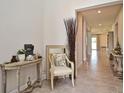 Bright and airy foyer with tile flooring and elegant decor at 4326 Silo Port Ct, Lakewood Ranch, FL 34211