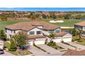 Modern townhouses with tile roofs and attached garages; luxury community at 5904 Wake Forest Run # 102, Bradenton, FL 34211