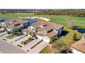 Luxury townhouses with golf course and lake views; community setting at 5904 Wake Forest Run # 102, Bradenton, FL 34211