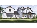 Two-story farmhouse with white siding, black accents, and a large front porch at 639 Oakford Rd, Sarasota, FL 34240