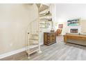 Unique spiral staircase connects the floors of this home at 752 Tropical Cir, Sarasota, FL 34242