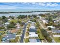 Aerial view of waterfront homes and neighborhood at 404 Bayside Ln, Nokomis, FL 34275