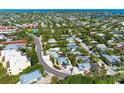 Wide aerial view of a neighborhood with a highlighted house at 5613 Gulf Dr, Holmes Beach, FL 34217