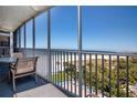 Spacious balcony overlooking beach and ocean at 6300 Midnight Pass Rd # 708, Sarasota, FL 34242