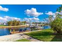 Relaxing waterfront dock with seating and beautiful views at 181 Beeney Se Rd, Port Charlotte, FL 33952