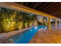 Relaxing pool with unique design and patio area at 315 Hammock Cir, Anna Maria, FL 34216