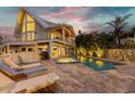Inviting pool and spa area with lounge chairs, perfect for relaxation at 315 Hammock Cir, Anna Maria, FL 34216