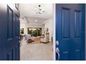 View through front door showing living room and kitchen at 4697 Antrim Dr, Sarasota, FL 34240