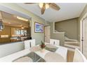 Dining area with white table and stairs leading to the second floor at 4918 25Th W St # 102, Bradenton, FL 34207