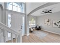 Light and airy living room with hardwood floors and ample natural light at 14146 Cattle Egret Pl, Bradenton, FL 34202