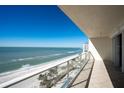 Oceanfront balcony showcasing beach and water views from a condo at 1800 Benjamin Franklin Dr # A801, Sarasota, FL 34236