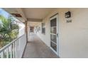 Condo hallway with access to individual units at 6507 Stone River Rd # 306, Bradenton, FL 34203