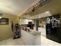 Spacious kitchen with granite countertops and white cabinets at 1007 Longfellow Cir, Sarasota, FL 34243