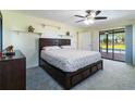 Spacious bedroom with backyard pool view at 33931 Serene Dr, Punta Gorda, FL 33982