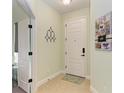 Bright entryway with tile flooring and access to other rooms at 4716 Foxtail Dr, Parrish, FL 34219
