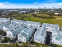 Aerial view of townhome community near park at 2462 Mangum Ct, Sarasota, FL 34237
