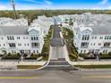 Aerial view of community with pool and landscaping at 2462 Mangum Ct, Sarasota, FL 34237