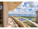 Spacious balcony overlooking water and golf course views at 3060 Grand Bay Blvd # 175, Longboat Key, FL 34228