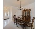 Formal dining room featuring a wood table and hutch at 6607 39Th Avenue W Cir, Bradenton, FL 34209