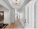 Interior hallway with tile flooring and access to other rooms at 1000 San Lino Cir # 1032, Venice, FL 34292