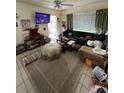 Living room featuring a comfortable couch and large TV at 4444 Los Rios St, North Port, FL 34287