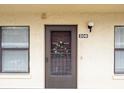 Condo front door entrance with wreath decoration at 635 30Th Ave W # F206, Bradenton, FL 34205