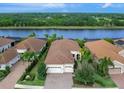 Single-Gathering home with two-car garage and lake view in a residential community at 7220 Whittlebury Trl, Lakewood Ranch, FL 34202