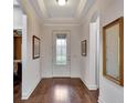Bright entryway with hardwood floors and large mirror at 12785 Fontana Loop, Bradenton, FL 34211