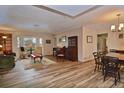 Open living and dining area with hardwood floors at 1864 Mid Ocean Cir, Sarasota, FL 34239