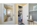 The condo unit has a small storage room or closet with ample storage space, next to a screened-in porch at 4802 51St W St # 1118, Bradenton, FL 34210