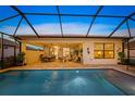 Inviting swimming pool with a covered patio for relaxing at 4947 Surfside Cir, Bradenton, FL 34211