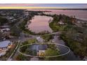 Property's aerial view showing waterfront location and neighborhood at 543 Hillcrest Dr, Bradenton, FL 34209