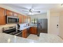 Galley kitchen with stainless steel appliances at 6033 34Th W St # 120, Bradenton, FL 34210