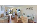 Bright living room and dining area with coastal decor at 6033 34Th W St # 120, Bradenton, FL 34210