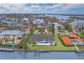 Waterfront property with pool and private dock, offering stunning water views at 740 Old Compass Rd, Longboat Key, FL 34228