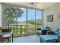 Relaxing balcony overlooking golf course and water at 8750 Olde Hickory Ave # 9205, Sarasota, FL 34238