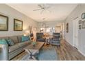 Living area featuring hardwood floors and comfortable seating at 8750 Olde Hickory Ave # 9205, Sarasota, FL 34238