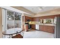 Bright kitchen featuring stainless steel appliances and light wood cabinets at 3339 Highlands Bridge Rd # 65, Sarasota, FL 34235