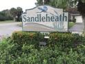 Sandleheath community entrance sign with landscaping at 3354 Sandleheath # 13, Sarasota, FL 34235